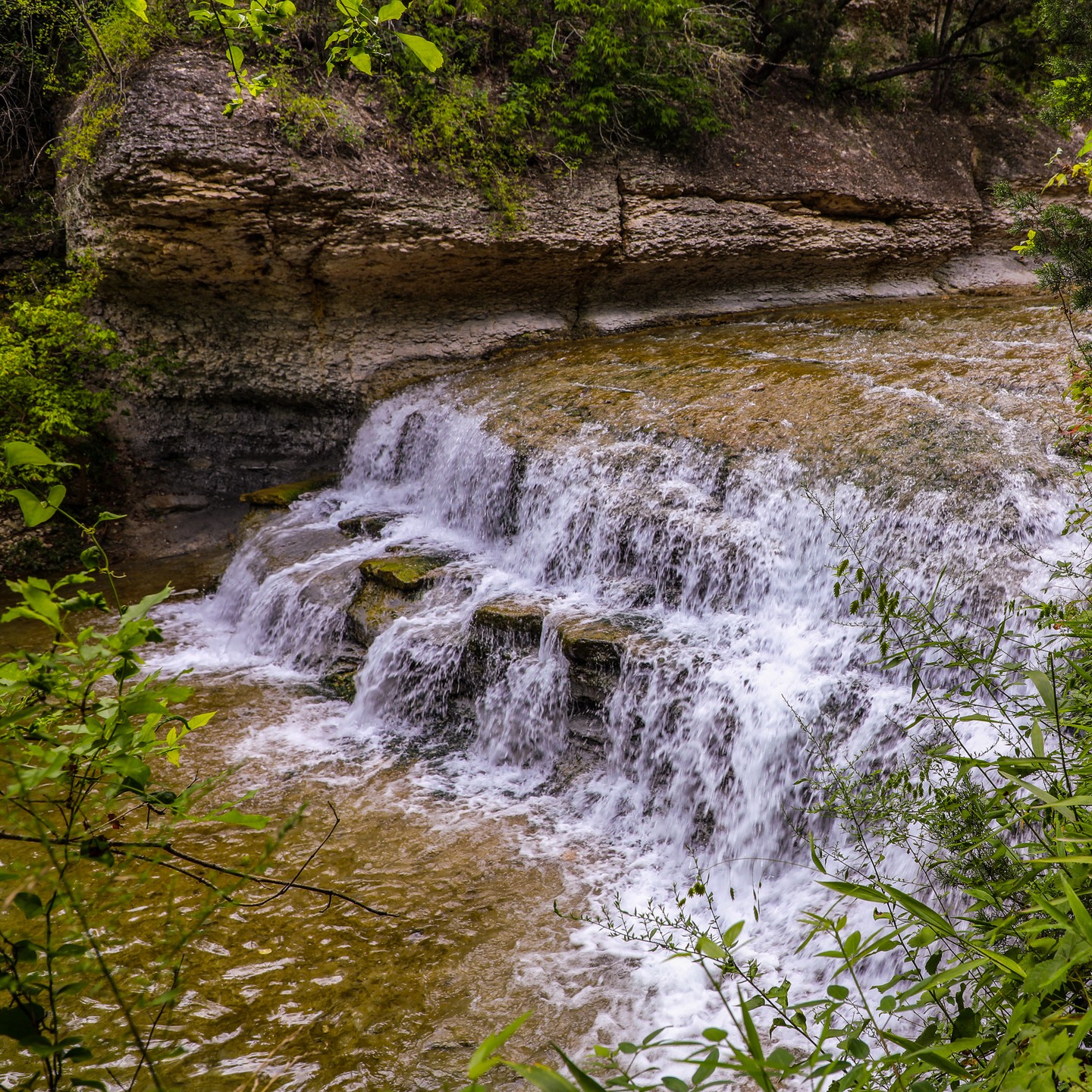 Adventure is just around the corner! Chalk Ridge Falls is only 10 minutes away, and is the perfect place for hiking, exploring, and soaking up nature’s beauty.  📸: @discovertemple Check it out  discovertemple.com. #RiverFarm #BeltonTX #BeltonTXRealEstate #BeltonTXNewHomes #BeltonISD #PaintedSteer